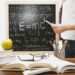 woman illustrating albert einstein formula