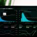 graphs of performance analytics on a laptop screen