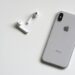 silver iphone x with airpods