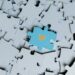 heart shape on a blue puzzle piece